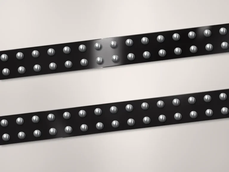 Illustration of silver studs on black PVC straps